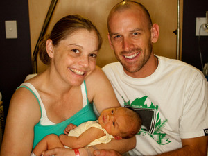 parents-and-newborn-by-Jon-Ovington.jpg