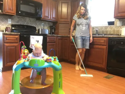 a baby activity center makes it easier to get things done around the house