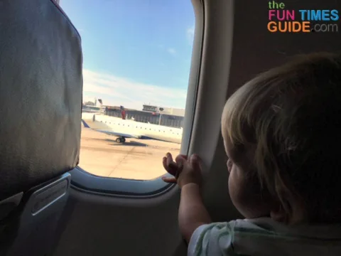 My son enjoyed learning about airplanes on his first plane ride.