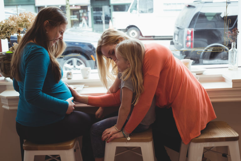 When Does A Baby Start Kicking? Here's What You Need To Know + How To