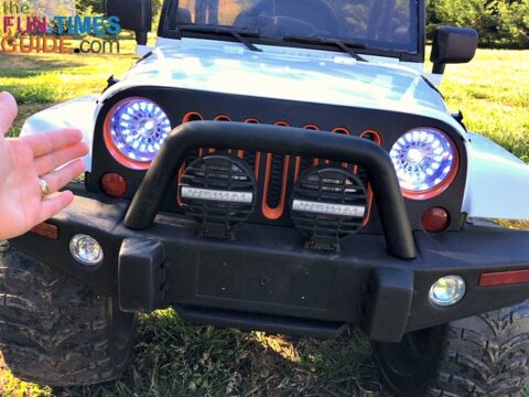 The LED headlights with Halo light rings on the Big Toys Green Country Jeep.