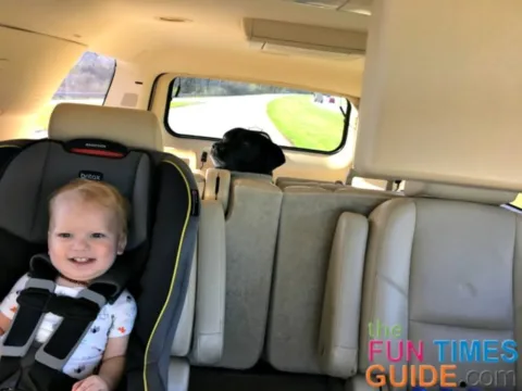 All smiles! Traveling with a toddler in the car is fun... as long as mom remembers to pack all the 'necessities'!