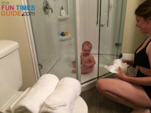 Babies are fascinated by water -- both coming from the showerhead and going down the drain!