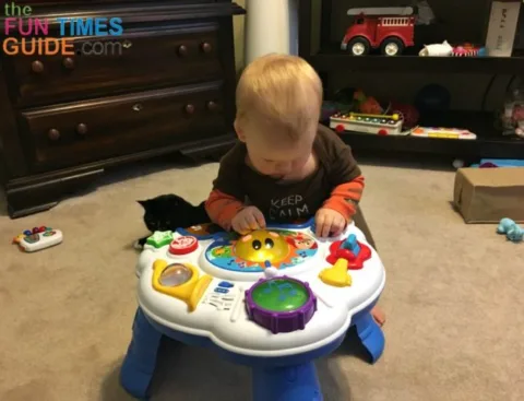 My son fully engaged with the Baby Einstein music table.