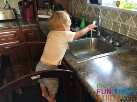 I like how the Little Partners learning tower makes it easier for a toddler to wash their own hands at the kitchen sink.