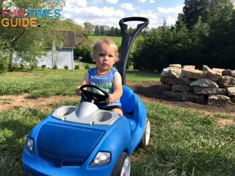 My toddler loves anything with wheels or a steering wheel. He can entertain himself anywhere we go in this ride on toy car with handle.