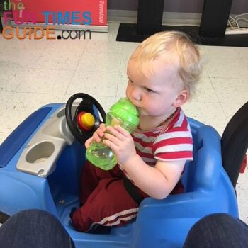 The 2 cup holders are at toddler-height, making it easy for him to reach his sippy cup and snacks on the go.