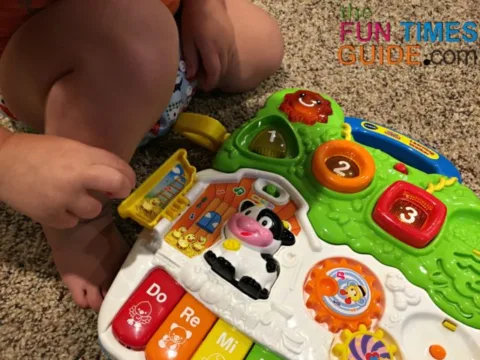 The VTech baby walker has a play panel which operates on 2 AA batteries. It can be used for play time on the floor or for mobile fun on the walker itself.