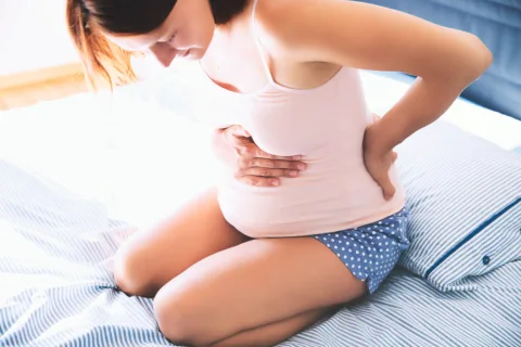 False labor contractions usually occur primarily in your back.
